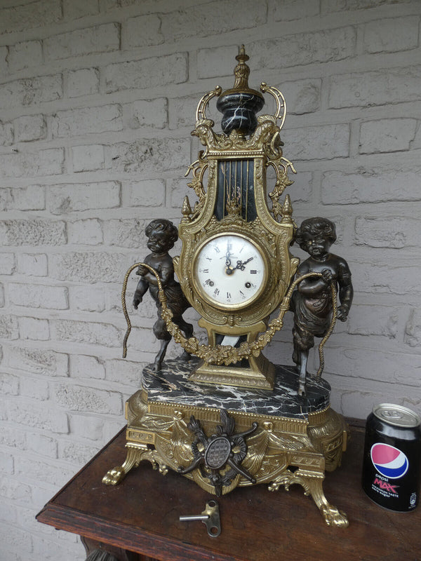 Italian  black marble bronze faun putti figural mantel clock 1970 rare top piece