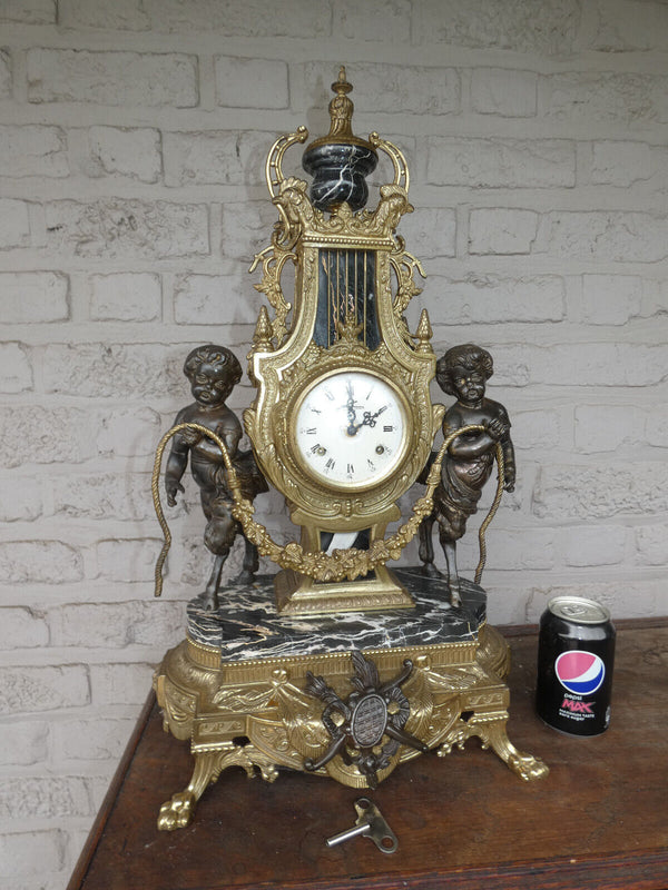 Italian  black marble bronze faun putti figural mantel clock 1970 rare top piece