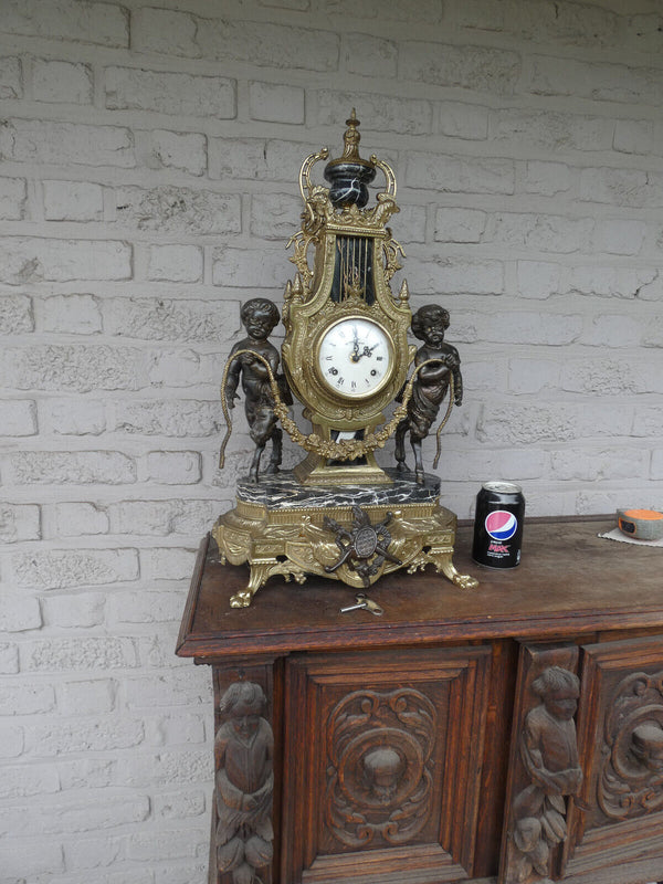 Italian  black marble bronze faun putti figural mantel clock 1970 rare top piece