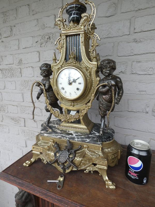 Italian  black marble bronze faun putti figural mantel clock 1970 rare top piece