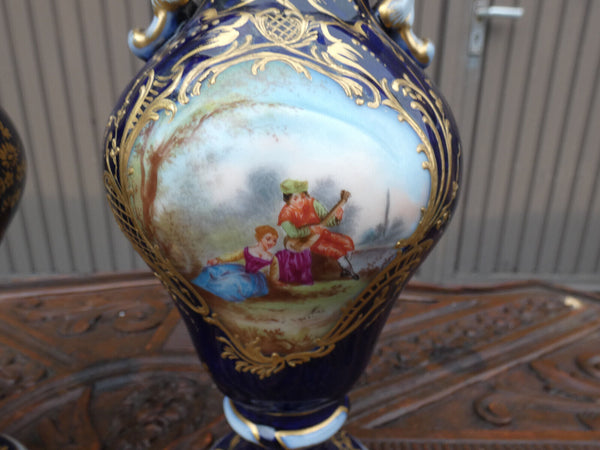 Pair antique French sevres style porcelain marked Romantic vases