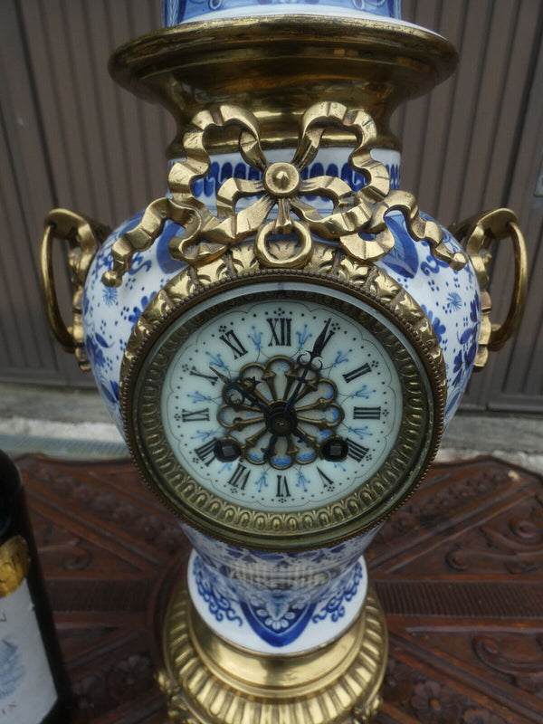 Antique Boch blue white pottery mantel clock brass putti angels decor