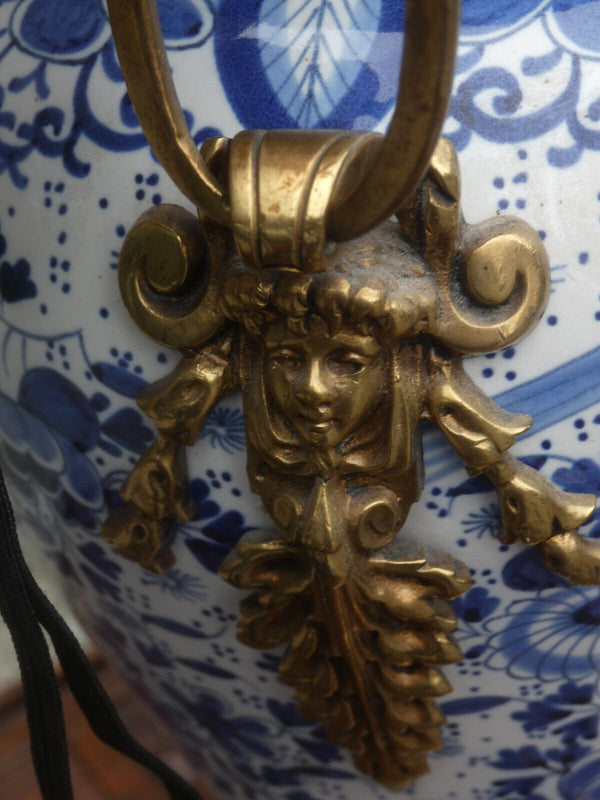 Antique Boch blue white pottery mantel clock brass putti angels decor