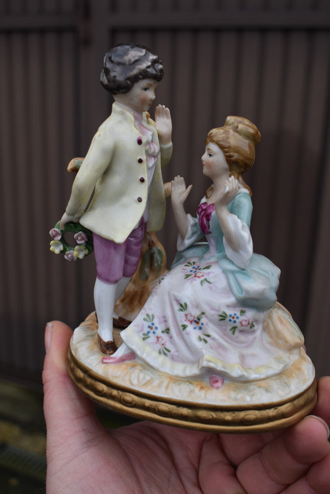 small vintage porcelain romantic couple figurine