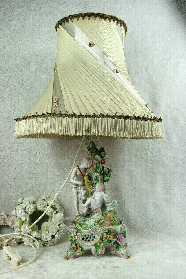 Antique porcelain table lamp figurines putti angel nude lady relief flowers