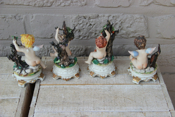 Italian set 4 capodimonte marked season cherub angel figurines