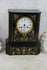 Antique Napoleon III portico clock black lacquered inlaid 19thc