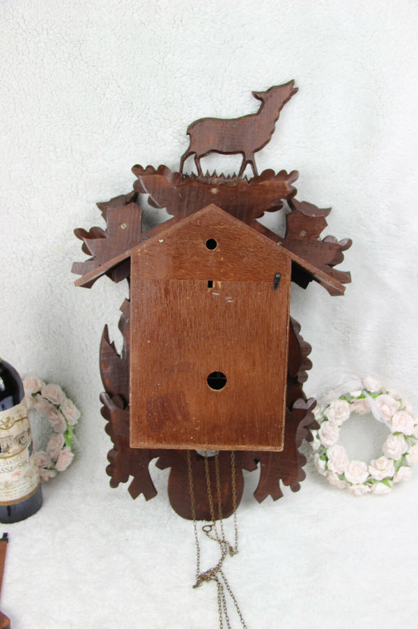 Vintage german cuckoo Wood carved black forest hunt theme Clock wall