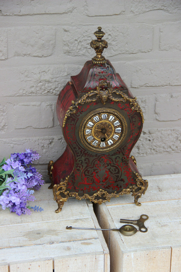 French antique boulle Devil head mantel clock