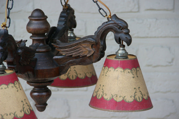 Antique German black forest wood carved griffin bird gothic 4 arm chandelier