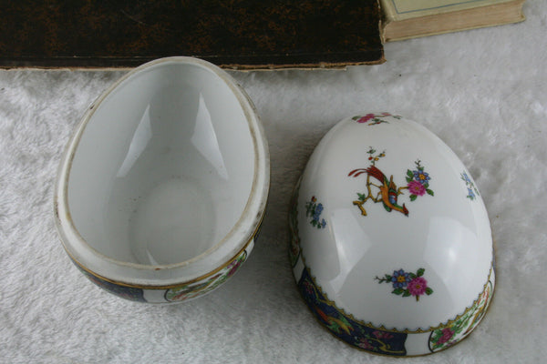 A large Easter Egg lidded box in Limoges marked porcelain with birds floral
