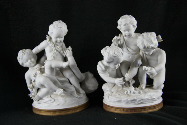Pair German Unterweissbach marked porcelain bisque putti angels group statues