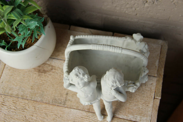 Small German bisque porcelain statue vase planter romantic young couple putti