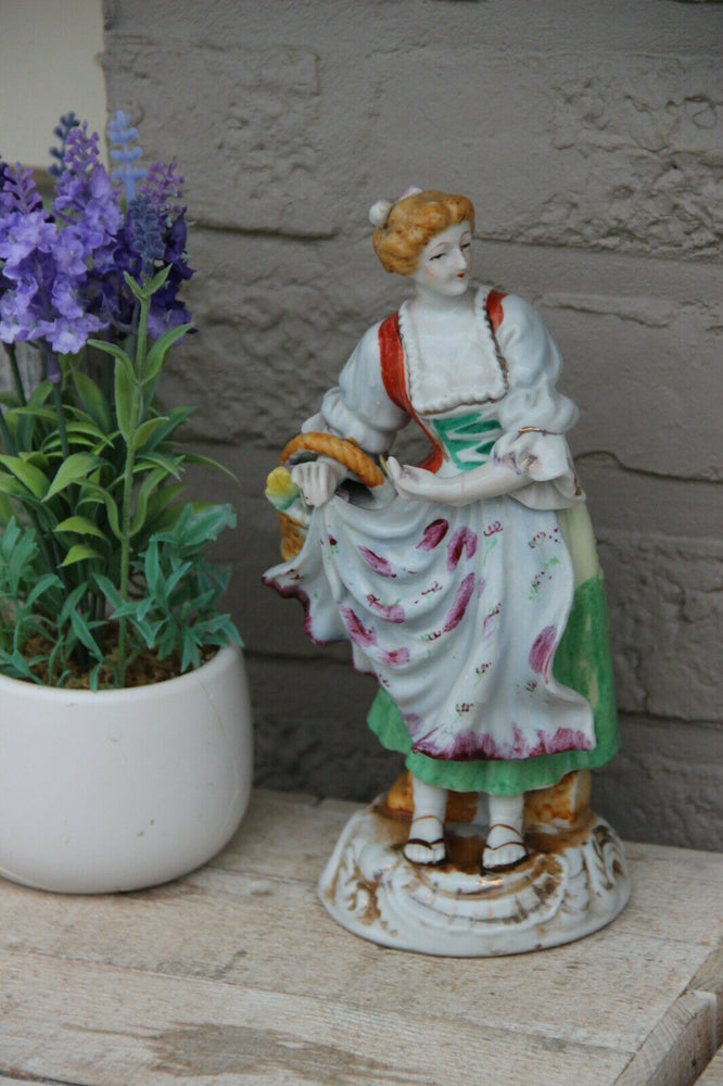 Vintage French porcelain lady fruit basket figurine statue