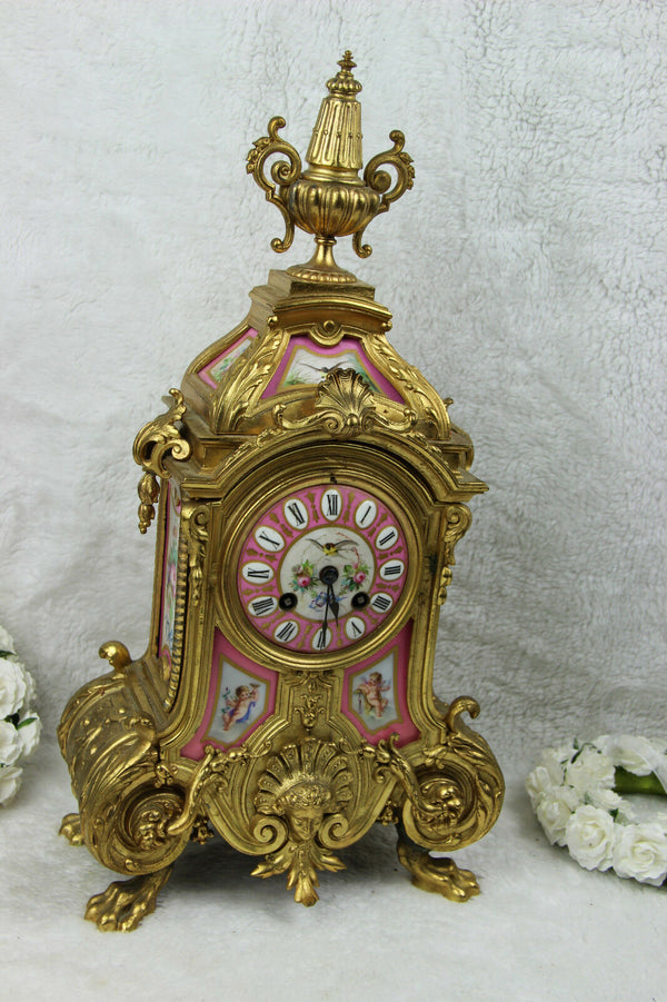Antique French Mantel clock pink sevres porcelain plaques putti bird floral