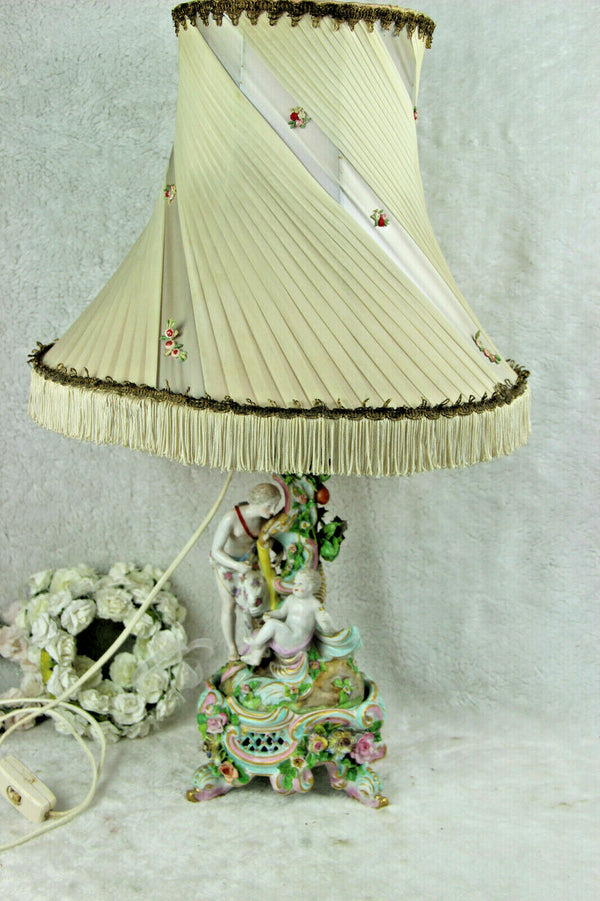 Antique porcelain table lamp figurines putti angel nude lady relief flowers