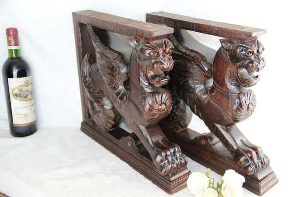 PAIR XL antique black forest wood carved Chimaera Griffin mythological figurine