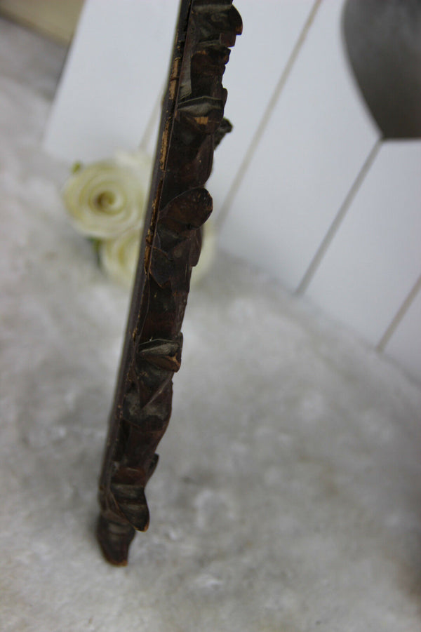 A Large antique napoleon III black forest wood carved crucifix velvet floral