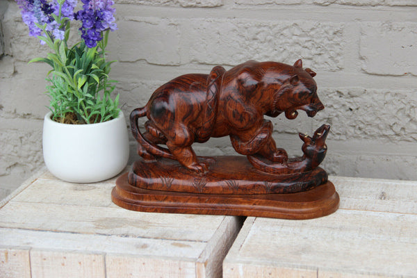 Rare japanese hand wood carved bear snake fight statue