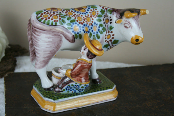 Dutch polychrome Makkum tichelaar marked girl milking cow pottery figurine