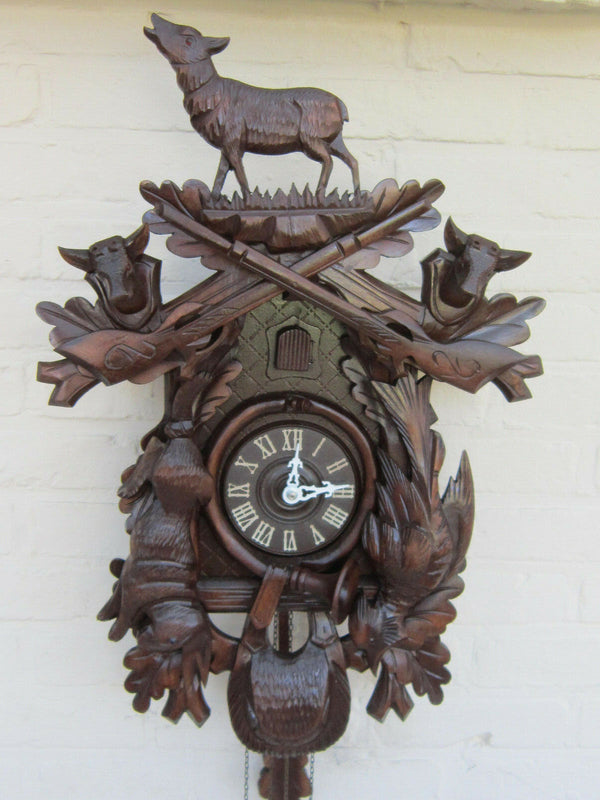 Vintage german cuckoo Wood carved black forest hunt theme Clock wall