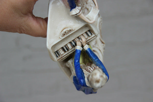 Antique german marked porcelain Statue group piano playing figurines