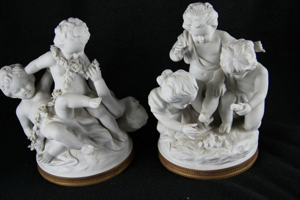 Pair German Unterweissbach marked porcelain bisque putti angels group statues