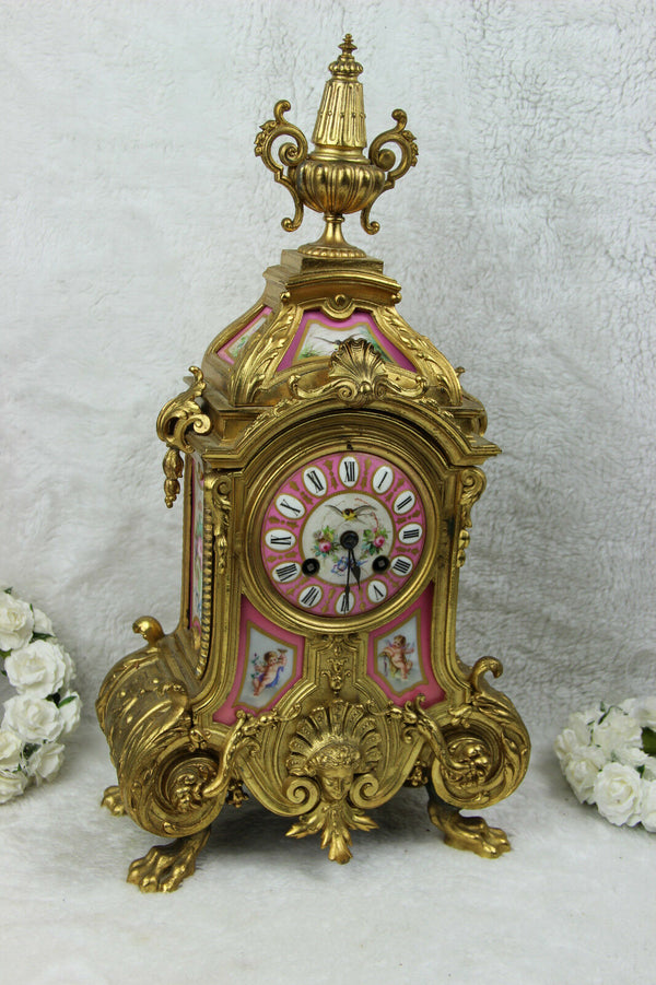 Antique French Mantel clock pink sevres porcelain plaques putti bird floral
