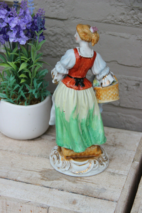 Vintage French porcelain lady fruit basket figurine statue