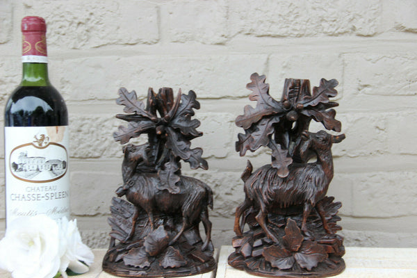 Antique Swiss Black forest wood carved candle holder Statue deer