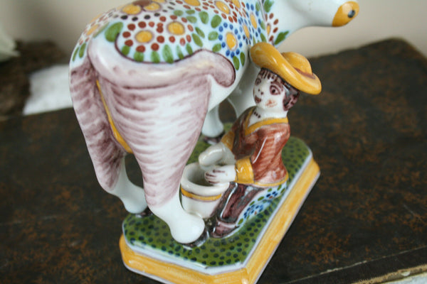 Dutch polychrome Makkum tichelaar marked girl milking cow pottery figurine