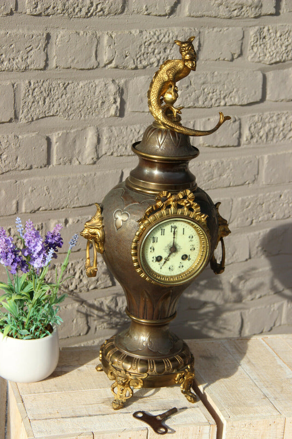 Antique French metal brass lion heads gothic dragon animal clock