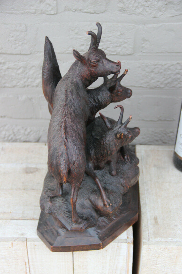 Large German black Forest wood carved capricorn deer group statue 19thc