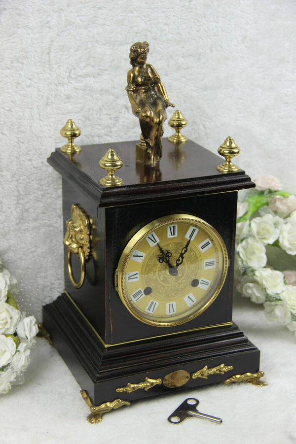 Vintage VANGESTEL Wood carved clock with bronze lady and lion heads 1970s FHS