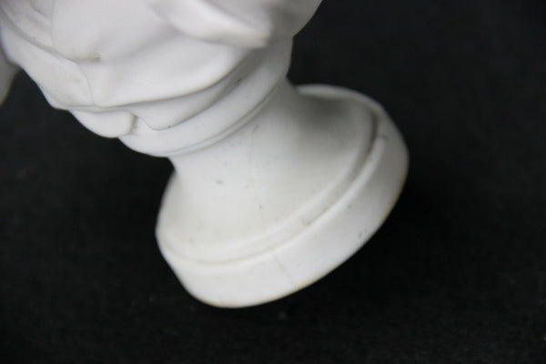 Set of 4 porcelain / bisque statues