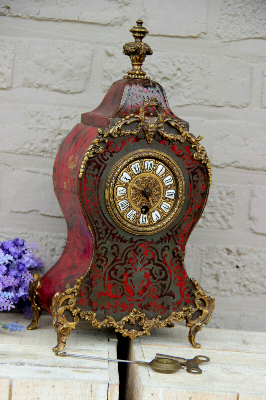 French antique boulle Devil head mantel clock