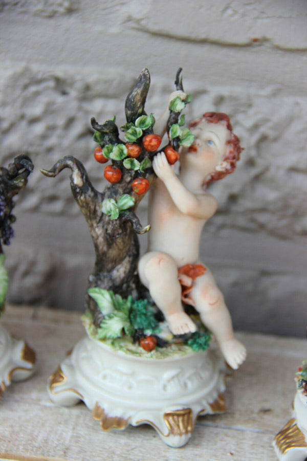 Italian set 4 capodimonte marked season cherub angel figurines