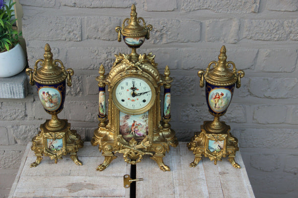 Stunning French Porcelain Clock set urns vases victorian romantic theme