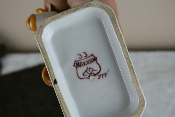 Dutch polychrome Makkum tichelaar marked girl milking cow pottery figurine