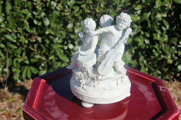 Antique French sevres mark bisque porcelain putti cherub group music