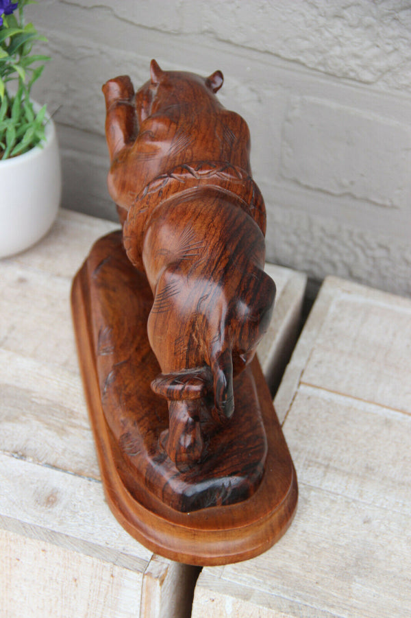 Rare japanese hand wood carved bear snake fight statue