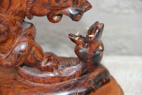 Rare japanese hand wood carved bear snake fight statue