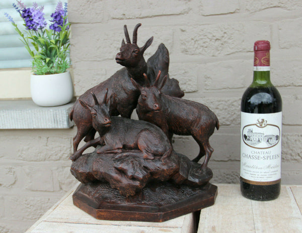 Large German black Forest wood carved capricorn deer group statue 19thc