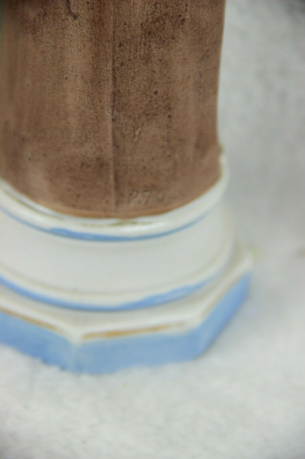 Antique religious porcelain bisque figurine of saint anthony with child