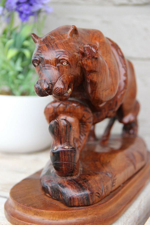 Rare japanese hand wood carved bear snake fight statue