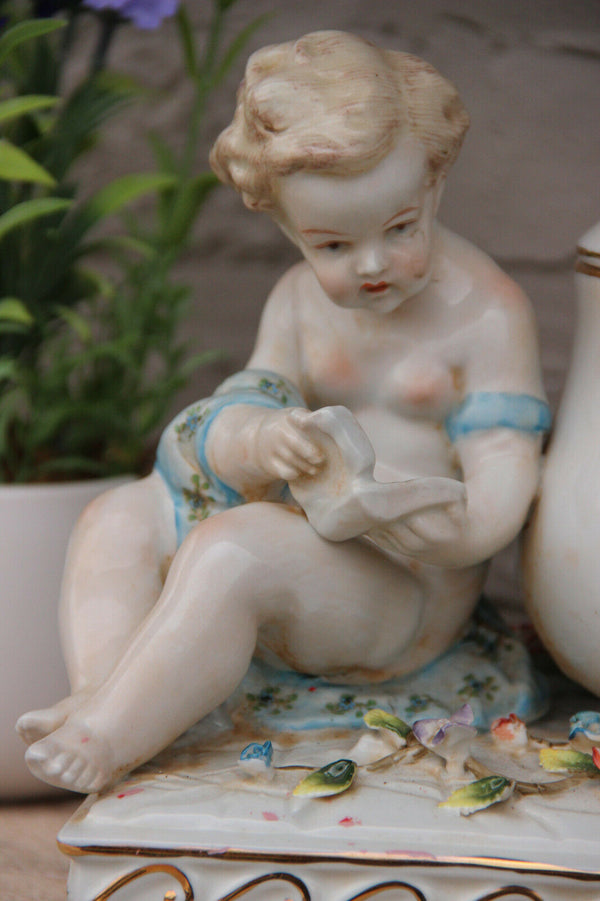 LARGE german porcelain putti figurine Centerpiece lidded Statue box floral decor