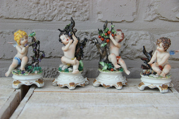 Italian set 4 capodimonte marked season cherub angel figurines