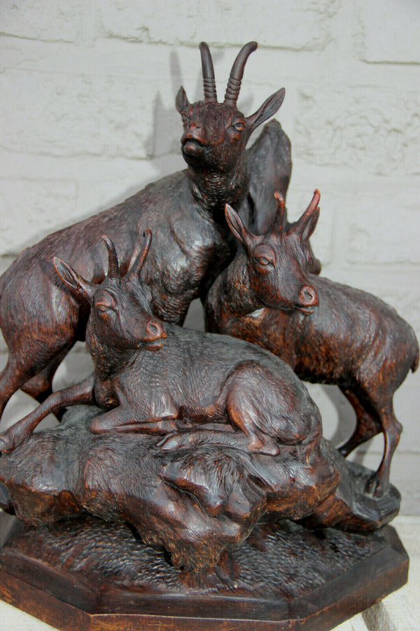 Large German black Forest wood carved capricorn deer group statue 19thc