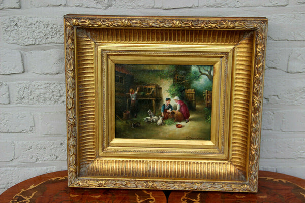 Antique oil panel painting farm scene feeding rabbits kids signed