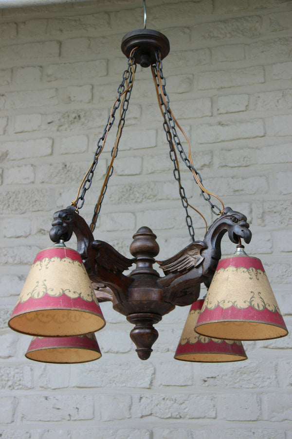 Antique German black forest wood carved griffin bird gothic 4 arm chandelier